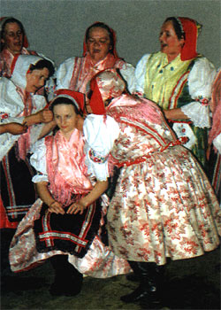 The Bride Receives Her Marriage Bonnet - a photography from the book Slovak Folk Customs and Traditions